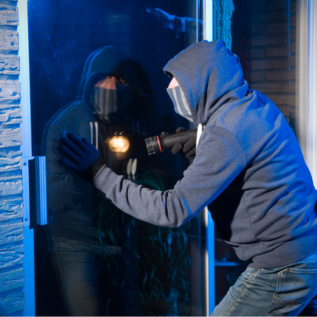Someone breaking into a home