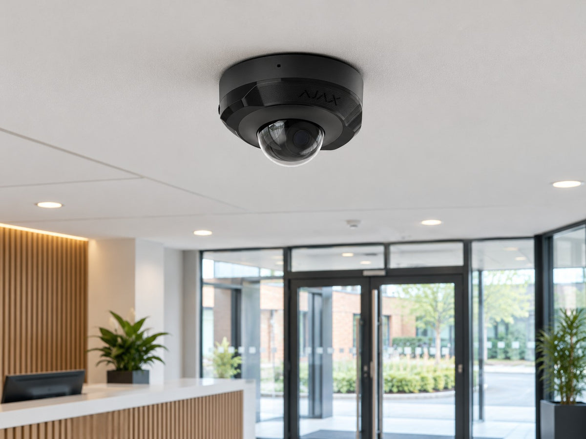 Ajax DomeCam Mini • 5MP 2.8mm • Black installed in British modern office reception.