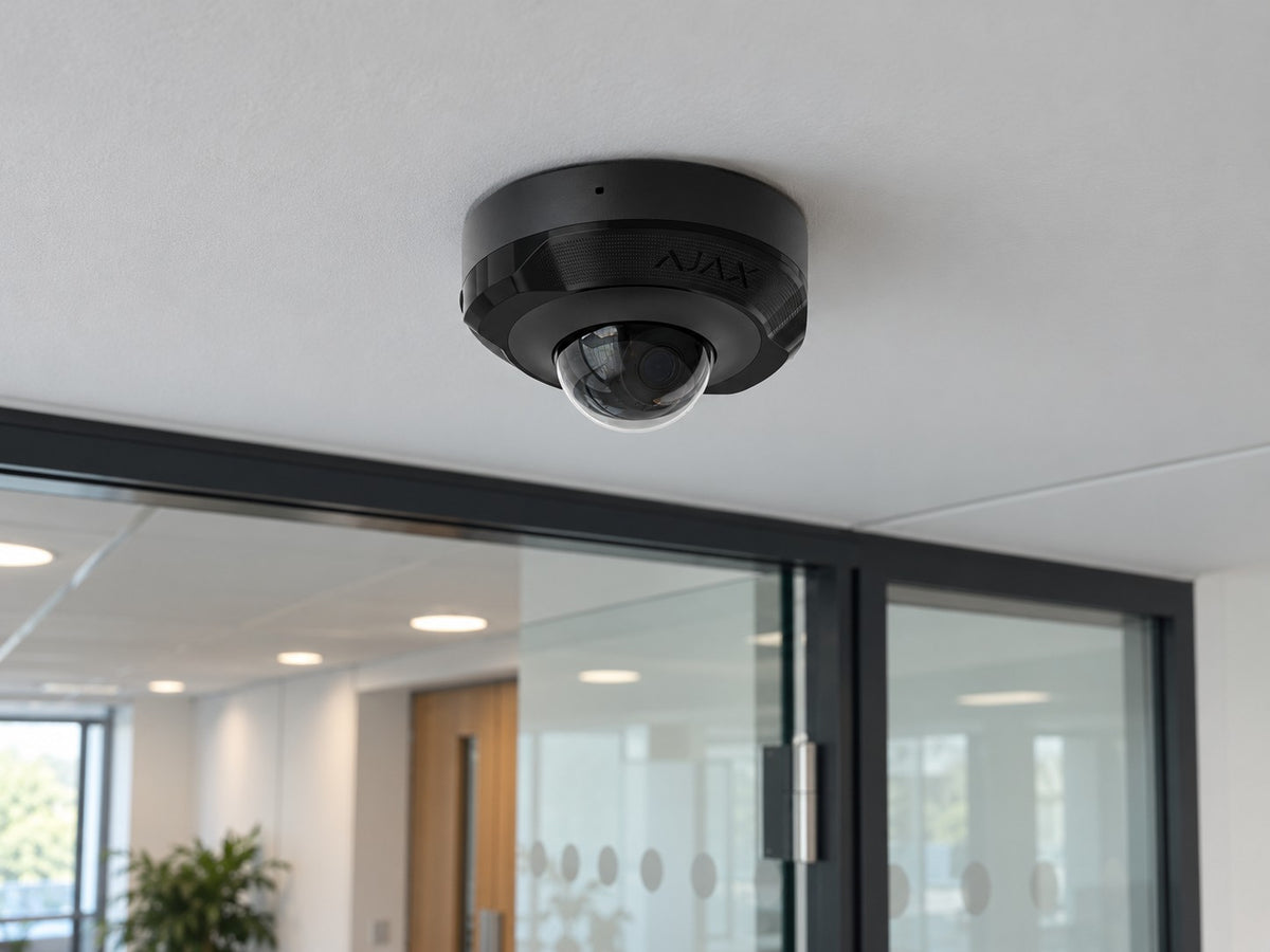 Ajax DomeCam Mini • 5MP 4mm • Black installed in British small office corridor.