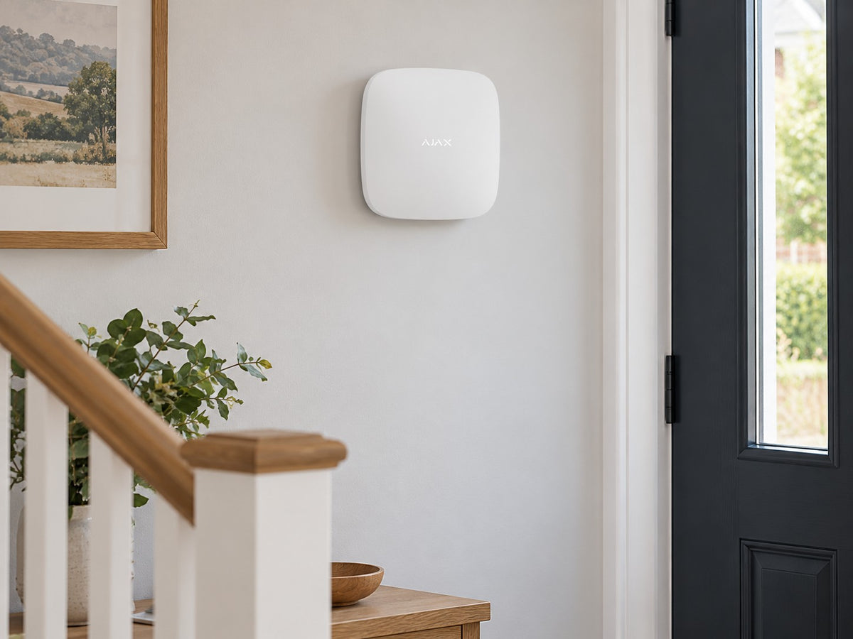 Ajax Hub 2 4G • White installed in bright British home hallway.