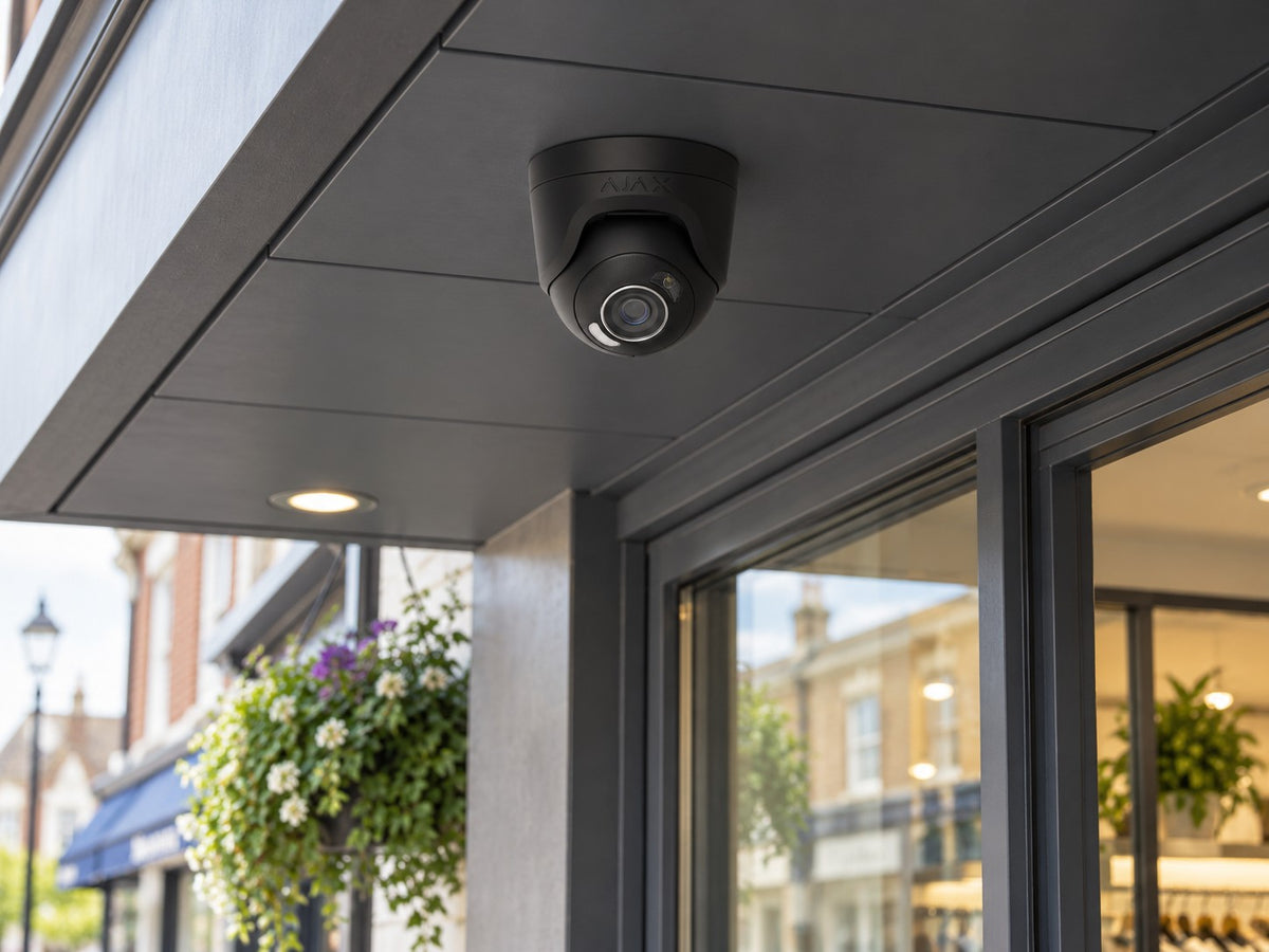 Ajax TurretCam HL • 5MP 2.8mm • Black installed in British shopfront entrance canopy.