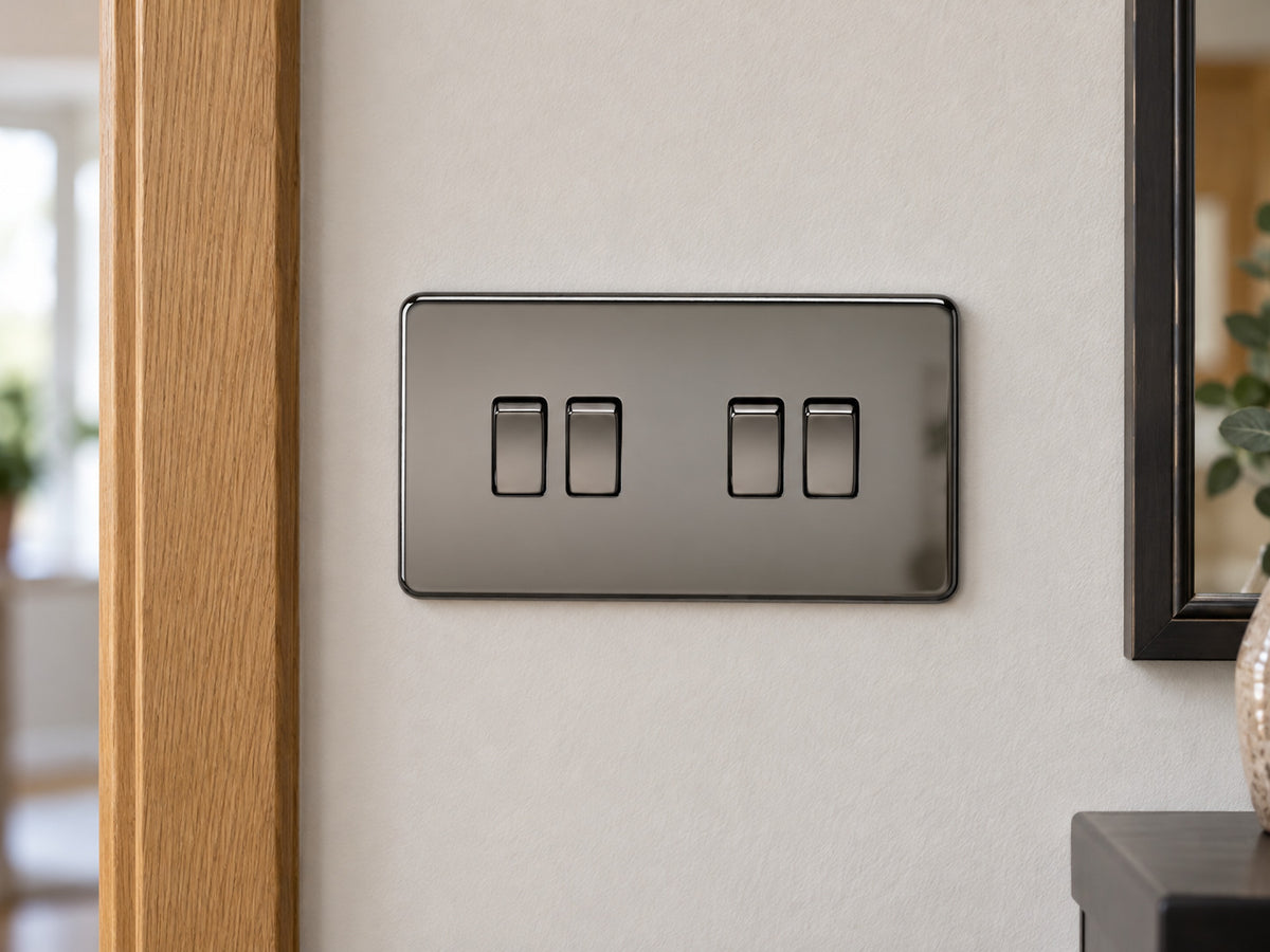 Knightsbridge SF4100BN black nickel light switch fitted on a UK hallway wall beside an oak door frame.