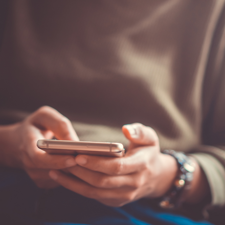 Person using mobile phone 