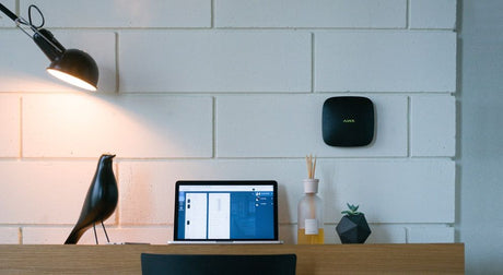 Ajax alarm above a desk