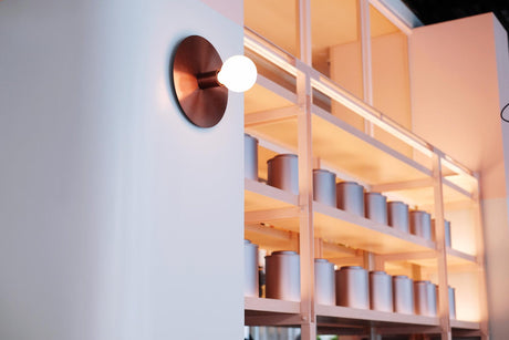 Low angle view of illuminated lights on wall in a shop