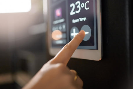 Smart home system wall and woman hands with digital app monitor for thermostat