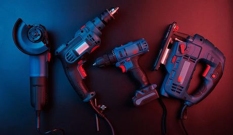 Set of new power tools isolated on a black background drill puncher electric saw jigsaw circular saw