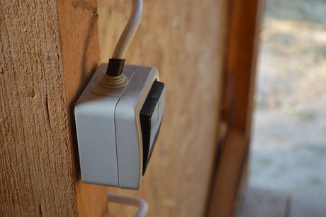 outdoor switches on wooden building 