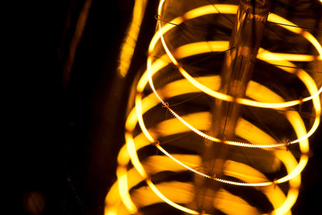 Close-up of illuminated lighting equipment