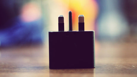black power adaptor on table 