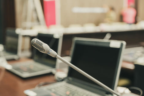 Close-up of microphone at desk
