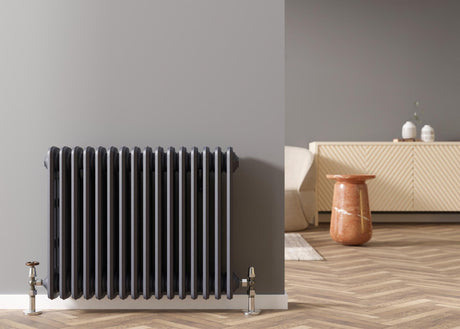 Heating radiator on grey wall in modern room