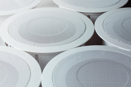 white speakers close together