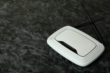 Wi-Fi router with external antennas on black smokey background