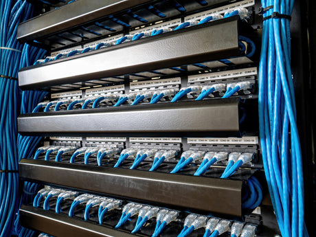 Connect data switches to patch panels using UTP patch cords