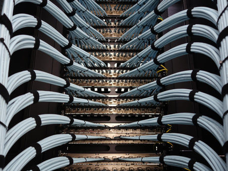 Detailed View of Organised Data Cables in a Server Rack Setup