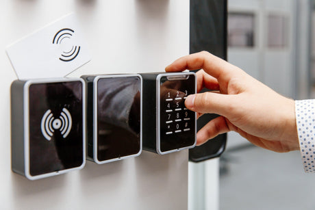 person using a keypad to gain entry 