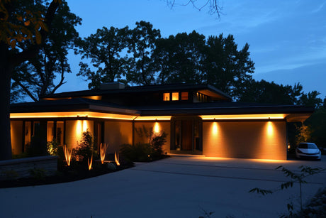 luxury, modern home with aesthetic outdoor lighting 