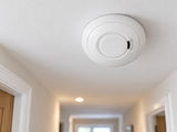 Aico Ei650iRF shown at a hallway ceiling.