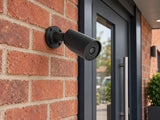 Ajax BulletCam • 5MP 2.8mm • Black installed in British small business entrance.