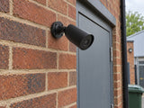 Ajax BulletCam 79027.217.BL1 installed in British independent shop service entrance.
