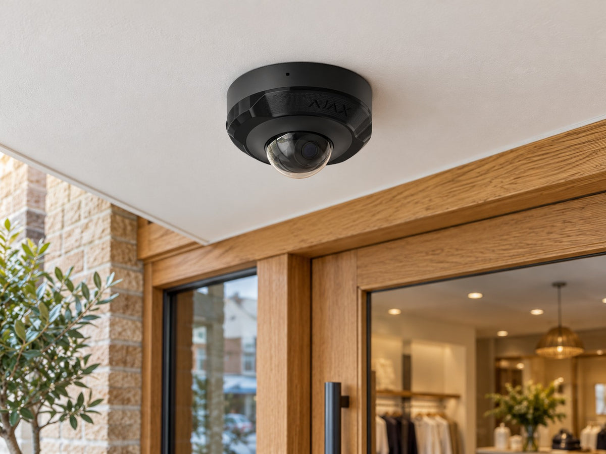 Ajax DomeCam Mini • 5MP 4mm • Black installed in British boutique entrance.