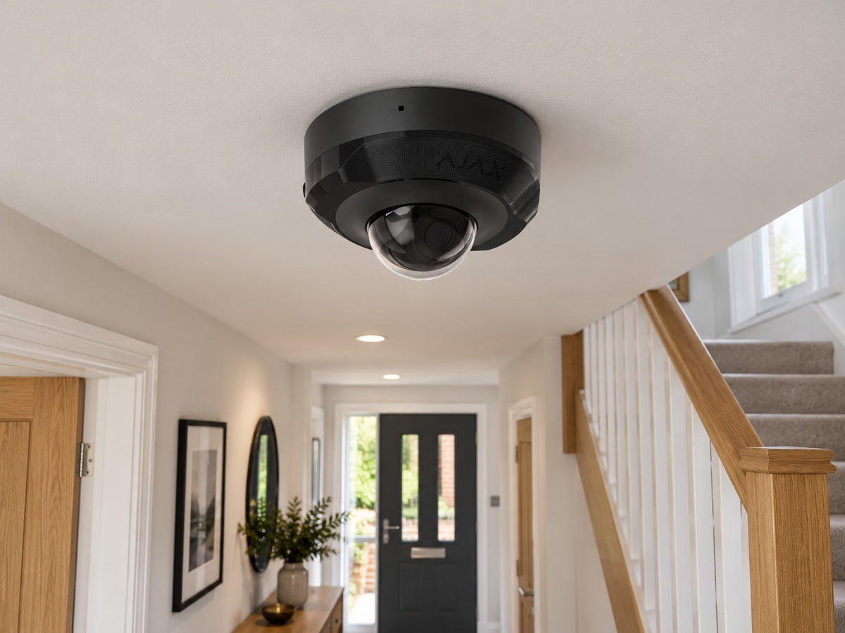 Ajax DomeCam Mini • 8MP 2.8mm • Black installed in British modern townhouse hallway.
