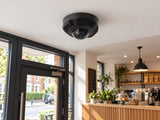 Ajax DomeCam Mini • 8MP 4mm • Black installed in British cafe entrance.
