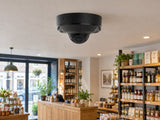 Ajax DomeCam Mini HL • 8MP 4mm • Black installed in neat British independent shop interior.