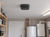 Ajax FireProtect 2 AC CO in a dry building utility room.