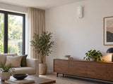 Ajax Superior MotionProtect G3 Fibra on a living-room wall.