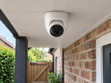 Ajax TurretCam • 8MP 2.8mm • White installed in British detached home covered side passage and garden gate.