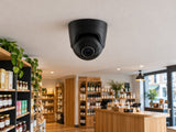 Ajax TurretCam • 8MP 4mm • Black installed in neat British independent shop interior.