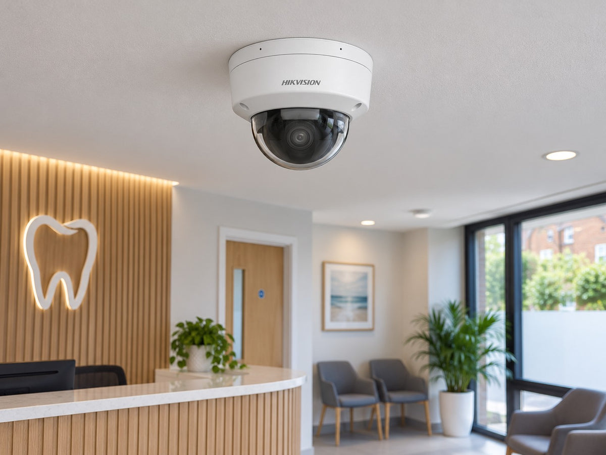 Hikvision DS-2CD2146G2H-ISU (white) installed in British dental practice reception.