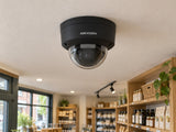 Hikvision DS-2CD2186G2H-ISU installed in British independent shop interior.
