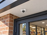 DS-2CD2526G2-IS in an illustrative building entrance setting.