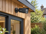 Hikvision DS-2CD2T47G3-LIY (black) installed in British garden studio entrance.