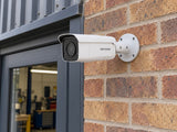 Hikvision DS-2CD2T66G2-2I (white) installed in British workshop pedestrian entrance.