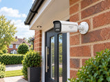 Hikvision DS-2CD2T87G3-LIS2UY/SL (white) installed in British suburban home entrance.