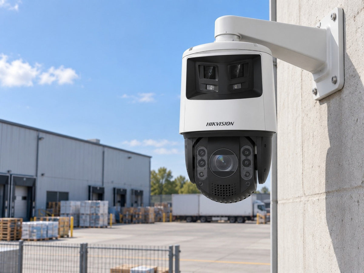 Hikvision DS-2SE7C432MWG-EB/26(F0) shown at an industrial yard.