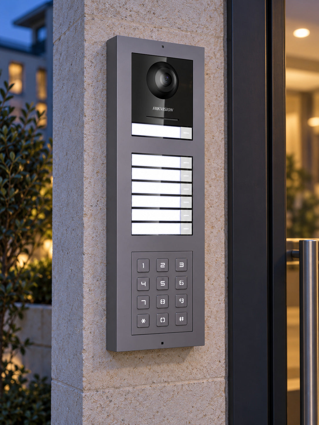 DS-KD-KP keypad in a station at an entrance at dusk; other modules and frame sold separately.